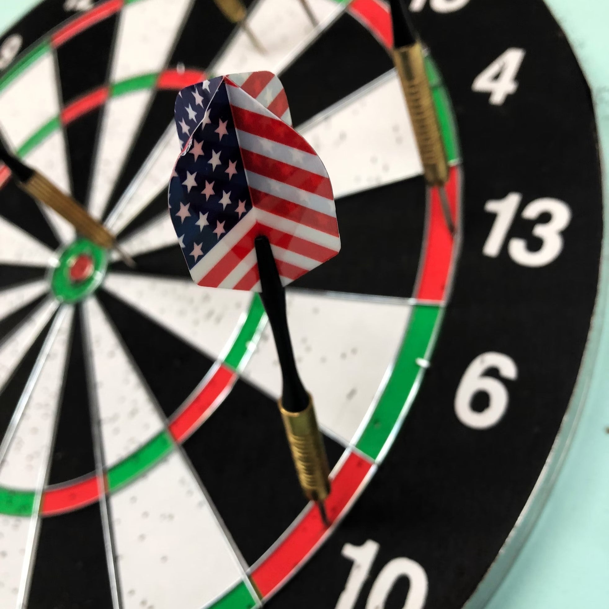 american flag dart in dartboard close up