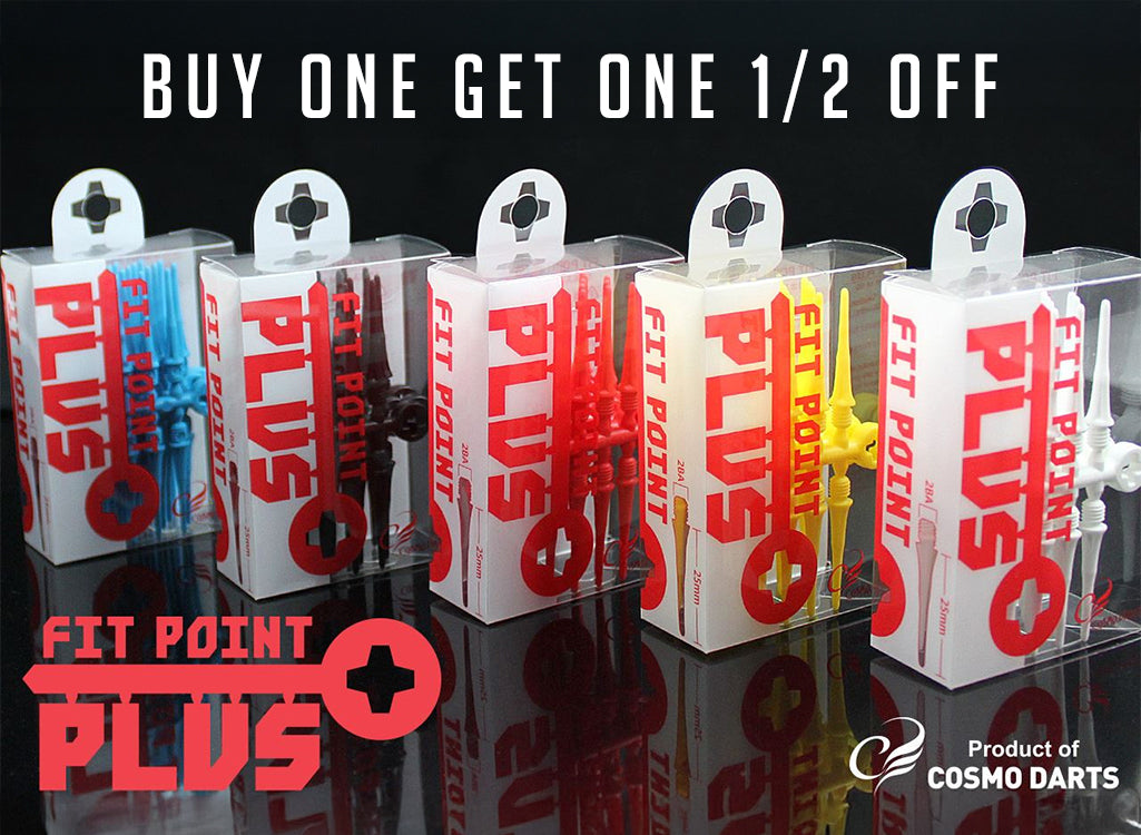 Five Fit Point Plus dart boxes in assorted colors (blue, black, red, yellow, white) lined up on a reflective black surface with promotional text 'BUY ONE GET ONE 1/2 OFF' and 'FIT POINT PLUS'.
