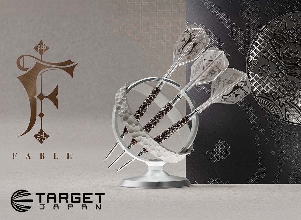 Decorative sculpture with darts on a stand, featuring 'Fable' logo and 'Target Japan' branding.